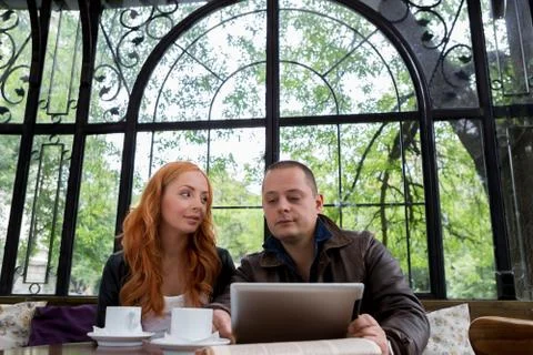 Two students drinking coffee 写真素材