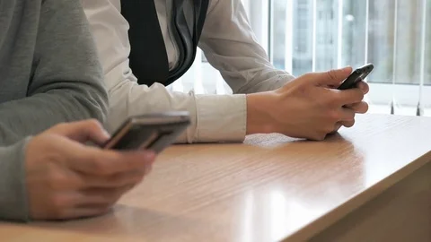Two students guys with smartphones Stock Footage 81079515