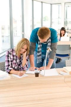Two students at high school writing notes 스톡 사진