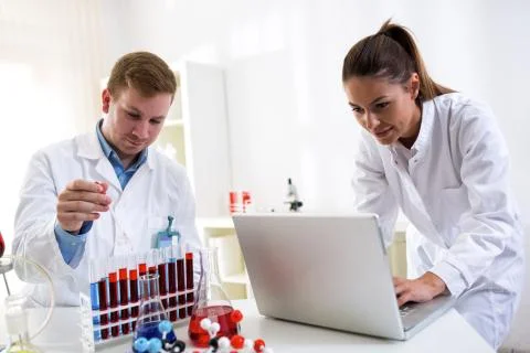 Two students researching at to the school lab Stock-Fotos