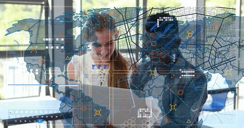 Two students tapping laptop and pointing screen, layering AR HUD with world map Fotos Stock