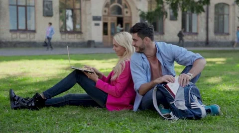 Two students use a laptop Stock Footage 42877518