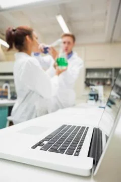 Two students working with liquids Stock Photos