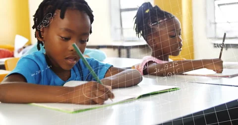 Two students writing notes igniting grid overlay with math symbols drifting over Stock Footage 312281027