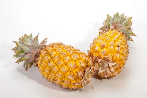 Two studio shot pineapples on white background Stock Photos