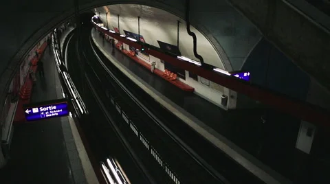 Two subway trains arrive at Paris platform Stock Footage 49362879