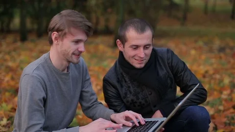 Two succesful man using laptop internet and typing Video stock 71252603