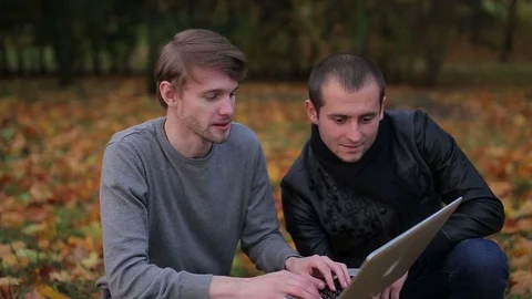 Two successful programmers says hello hi welcome to the camera Stock Footage 71252471