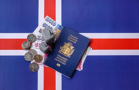 Two suitcases on a Iceland flag representing the concept of travel, emigrat.. Stock Photos