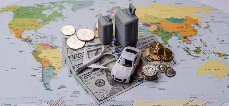 Two suitcases on a map representing the concept of travel, emigration, or a.. Stock Photos