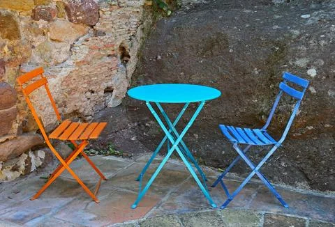 Two summer chairs and a table Stock Photos