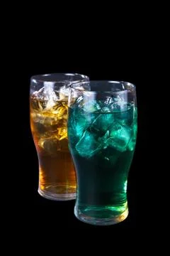 Two summer cocktail on isolated black background Stock Photos