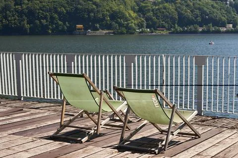 Two sunbeanch at pier Stock Photos
