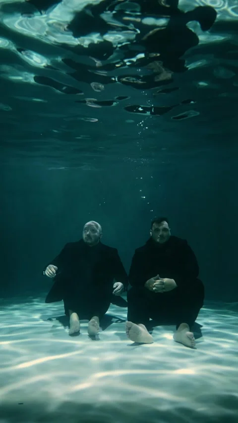 Two super agents are hiding underwater and waiting for the appointed time. Stock Footage 315559114