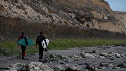 Two surf boarders Stock Footage 83175245