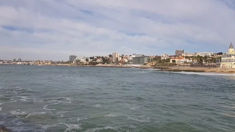 Two surfers are waiting for the wave. Estoril Portugal Stock Footage 103609306