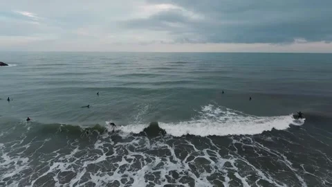 Two surfers catching the Waves in Valencia, Spain. Stock Footage 150800385