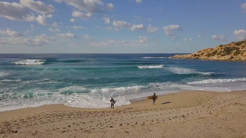 Two surfers jumping in the water Video stock 94508481