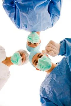 Two surgeons and an assistant looking confident Stock Photos