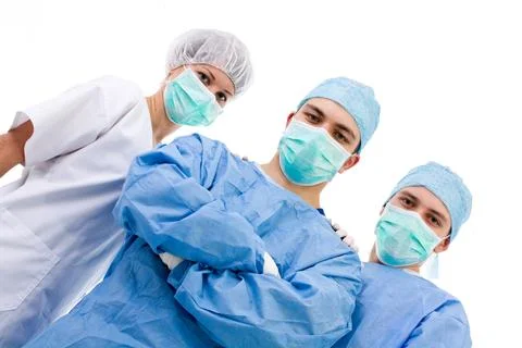 Two surgeons and an assistant looking confident Stock Photos