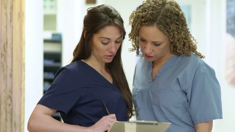Two surgeons having a conversation Stock-Footage 83393735