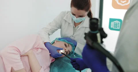 Two Surgeons Perform Endoscopic Surgery Using Modern Equipment. Medical Team Video stock 148132885