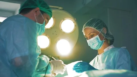 Two surgeons of surgeons at the work 스톡 동영상 113620487