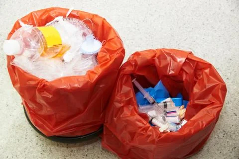Two surgical garbage bins in operating room Stock Photos