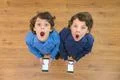 The two surprised twin phone. View from above Photo