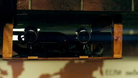 Two surveillance or broadcast cameras are suspended from the ceiling. Close up. Stock Footage 122345877