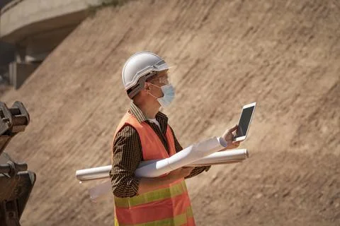 Two Surveyor builder Engineer technician  Business Team discuss plan at new c Foto stock