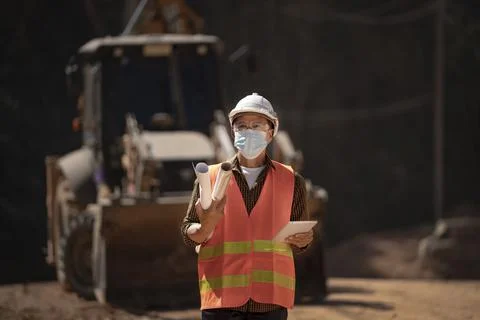 Two Surveyor builder Engineer technician  Business Team discuss plan at new c Stock Photos