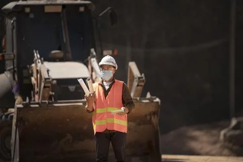 Two Surveyor builder Engineer technician  Business Team discuss plan at new c Stock Photos