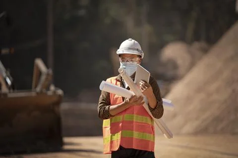 Two Surveyor builder Engineer technician  Business Team discuss plan at new c Stock-Fotos