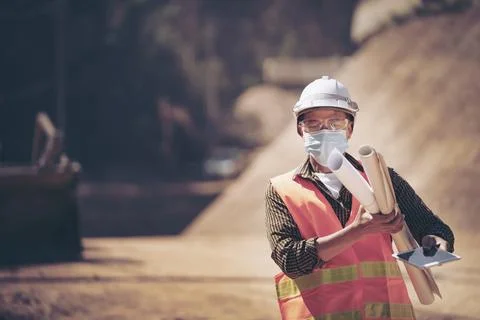 Two Surveyor builder Engineer technician  Business Team discuss plan at new c Stock Photos