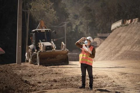 Two Surveyor builder Engineer technician  Business Team discuss plan at new c Stock-Fotos
