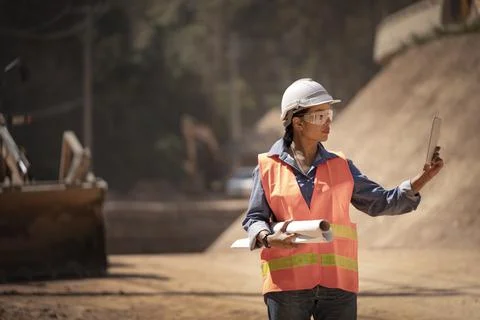 Two Surveyor builder Engineer technician  Business Team discuss plan at new c Stock-Fotos