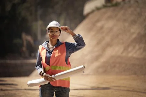 Two Surveyor builder Engineer technician  Business Team discuss plan at new c Stock Photos