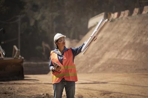 Two Surveyor builder Engineer technician  Business Team discuss plan at new c Stock-Fotos