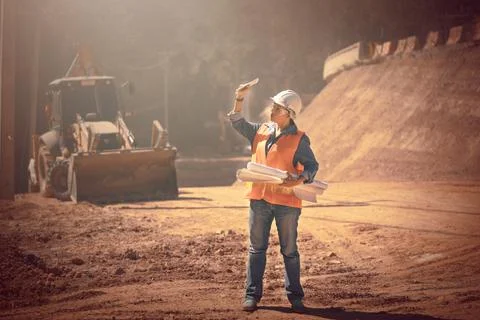 Two Surveyor builder Engineer technician  Business Team discuss plan at new c Stock-Fotos