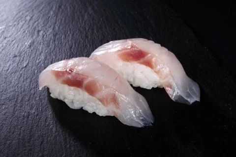 Two sushi on slate Stock Photos