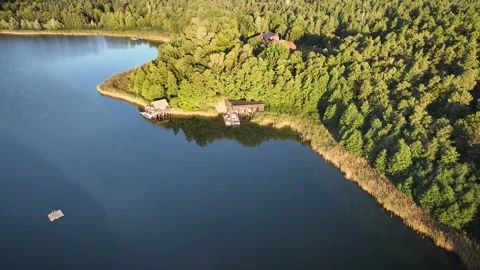 Two swans soar above a secluded. Stock-Footage 318869952