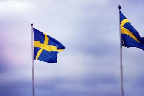 Two Swedish Flags Waving Stock Photos