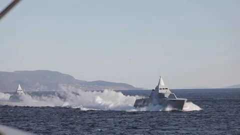 Two Swedish Visby-class corvettes sailing in the ocean - 2018 Stock Footage 105166027