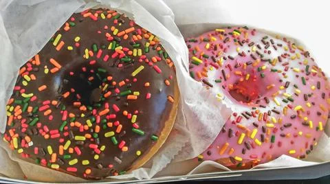 Two sweet donuts with glace Foto stock