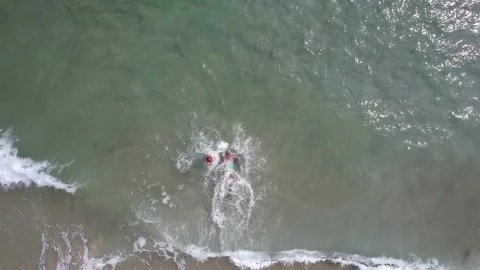 Two Swimmers in Ocean Paradise Stock Footage 289012225