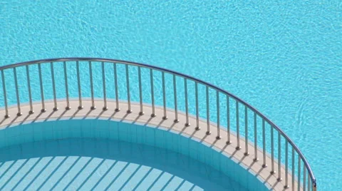 Two swimming pools and separating ledge with steel handrails Stock Footage 34414933