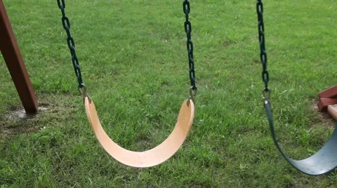Two swings blowing in the wind. Vidéo 50339976