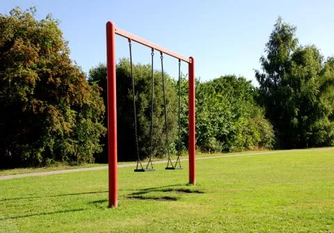 Two swings at the park Stock Photos