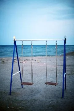 Two swings Stock Photos